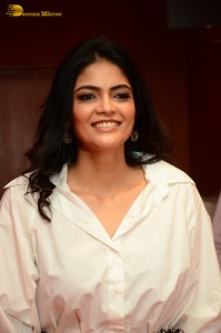 Indian Actress Kalpika Ganesh in a white shirt