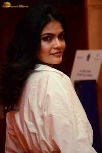 Indian Actress Kalpika Ganesh in a white shirt