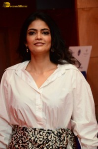 Indian Actress Kalpika Ganesh in a white shirt