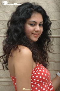 Kamna Jethmalani in a white dotted orange top and jeans