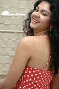 Kamna Jethmalani in a white dotted orange top and jeans