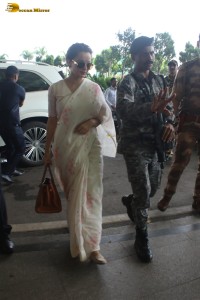 actress and MP Kangana Ranaut spotted in a white saree at mumbai airport