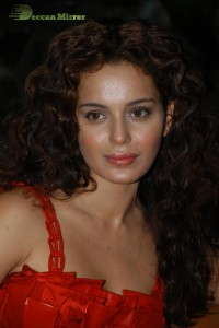 Kangana Ranaut in a short red dress attending a movie function