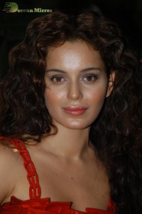 Kangana Ranaut in a short red dress attending a movie function