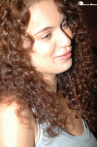 Actress Kangana Ranaut dressed in a grey top and black trousers