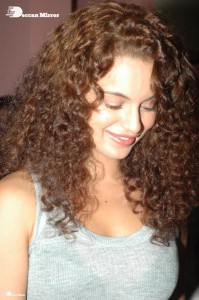 Actress Kangana Ranaut dressed in a grey top and black trousers