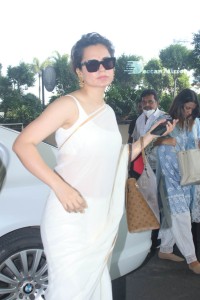 Kangana Ranaut in a white saree at the airport