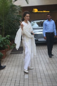 Actress Kangana Ranaut in a white salwar kameez