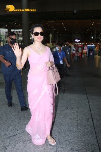 Kangana Ranaut in a pink saree seen at the Airport
