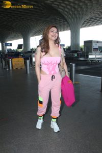 actress Kangna Sharma dressed in pink at mumbai airport