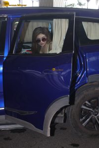 actress Kangna Sharma pretty in a yellow tank top at mumbai airport