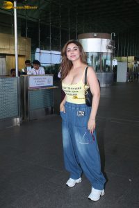 actress Kangna Sharma pretty in a yellow tank top at mumbai airport