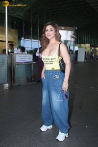 actress Kangna Sharma pretty in a yellow tank top at mumbai airport