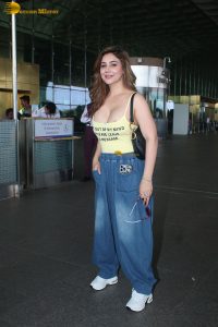 actress Kangna Sharma pretty in a yellow tank top at mumbai airport