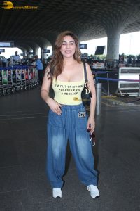 actress Kangna Sharma pretty in a yellow tank top at mumbai airport