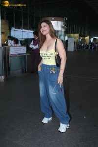 actress Kangna Sharma pretty in a yellow tank top at mumbai airport