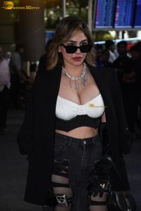 actress Kangna Sharma gorgeous in a white top and black jacket