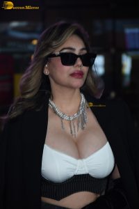 actress Kangna Sharma gorgeous in a white top and black jacket