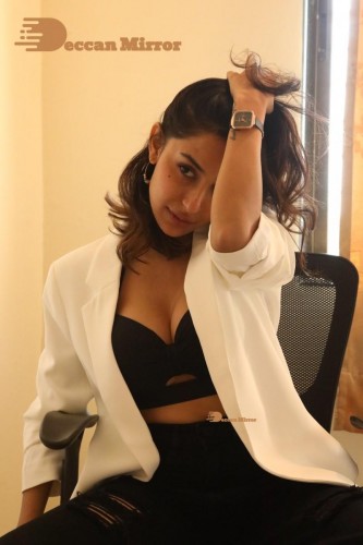 Bollywood and Telugu Cinema Actress Kapilakshi Malhotra posing for a hot photoshoot in black and white dress