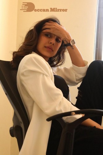 Bollywood and Telugu Cinema Actress Kapilakshi Malhotra posing for a hot photoshoot in black and white dress