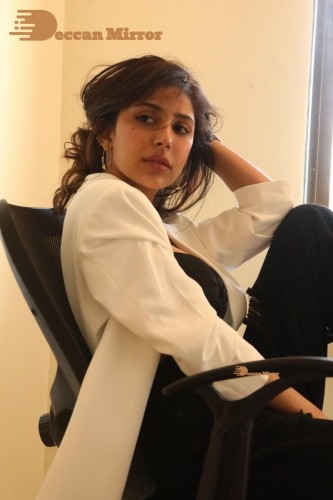 Bollywood and Telugu Cinema Actress Kapilakshi Malhotra posing for a hot photoshoot in black and white dress