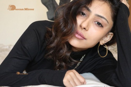 Bollywood and Telugu Cinema Actress Kapilakshi Malhotra poses for pictures in black top and blue jeans