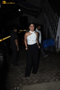Indian actress kareena kapoor in a white top and black pants