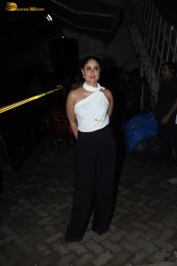 Indian actress kareena kapoor in a white top and black pants