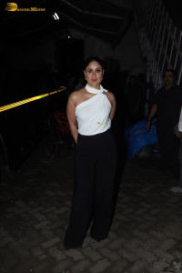 Indian actress kareena kapoor in a white top and black pants