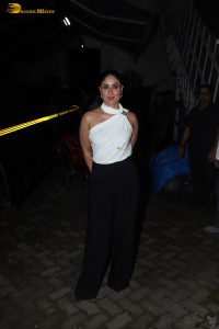 Indian actress kareena kapoor in a white top and black pants