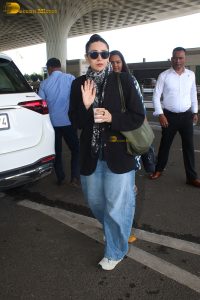 bollywood actress Karisma Kapoor stylish in sunglasses and a black jacket
