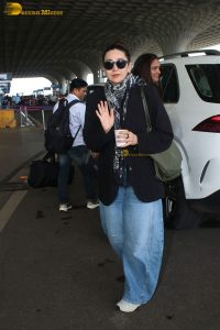 bollywood actress Karisma Kapoor stylish in sunglasses and a black jacket