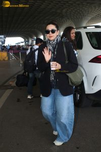 bollywood actress Karisma Kapoor stylish in sunglasses and a black jacket
