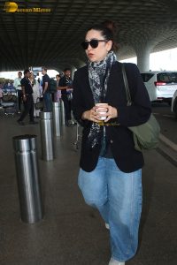 bollywood actress Karisma Kapoor stylish in sunglasses and a black jacket
