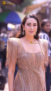 actress karishma kapoor sexy in a gold and silver dress