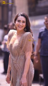 actress karishma kapoor sexy in a gold and silver dress