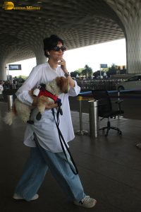 actress karishma tanna with her cute dog at airport