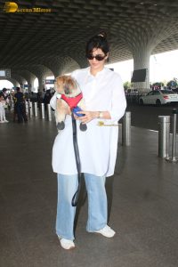 actress karishma tanna with her cute dog at airport