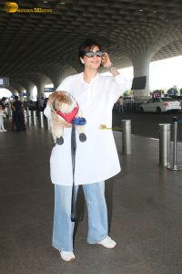 actress karishma tanna with her cute dog at airport