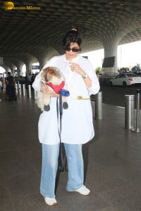 actress karishma tanna with her cute dog at airport