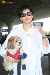 actress karishma tanna with her cute dog at airport
