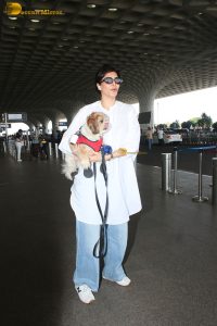 actress karishma tanna with her cute dog at airport