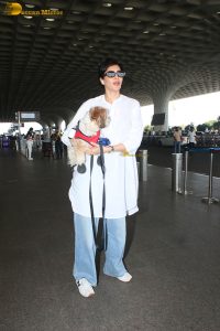 actress karishma tanna with her cute dog at airport