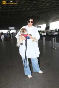 actress karishma tanna with her cute dog at airport