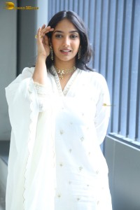 actress karthika muralidharan cute in a white salwar kameez photoshoot