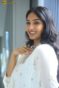 actress karthika muralidharan cute in a white salwar kameez photoshoot