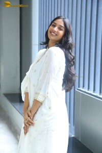 actress karthika muralidharan cute in a white salwar kameez photoshoot