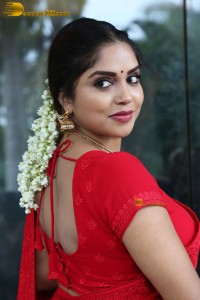 Telugu actress Karunya Chowdary beautiful in a red saree