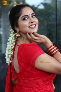 Telugu actress Karunya Chowdary beautiful in a red saree