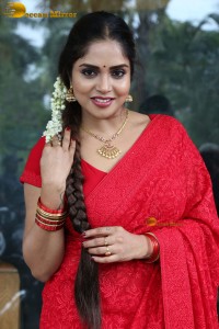 Telugu actress Karunya Chowdary beautiful in a red saree